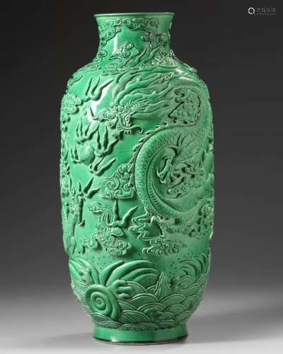 A CHINESE MOLDED GREEN GLAZED 'DRAGON' VASE