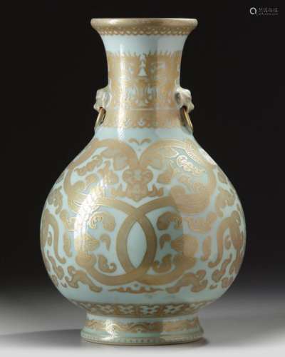 A CHINESE ARCHAISTIC CELADON GROUND GILT DECORATED…