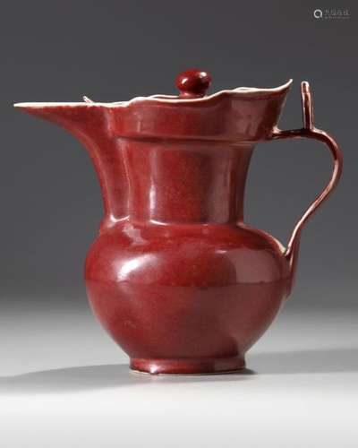 A CHINESE RUBY RED GLAZED MONK'S CAP EWER