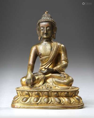 A SINO TIBETAN GILT BRONZE FIGURE OF SHAKYAMUNI