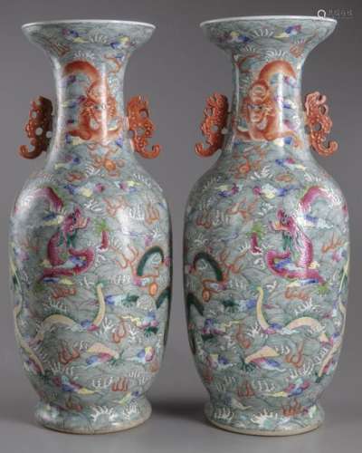 A pair of Chinese famille rose ‘nine dragon’ vases