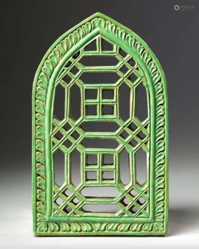 AN INDIAN GREEN GLAZED POTTERY TILE