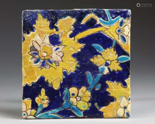 A SAFAVID CUERDA SECA POTTERY TILE