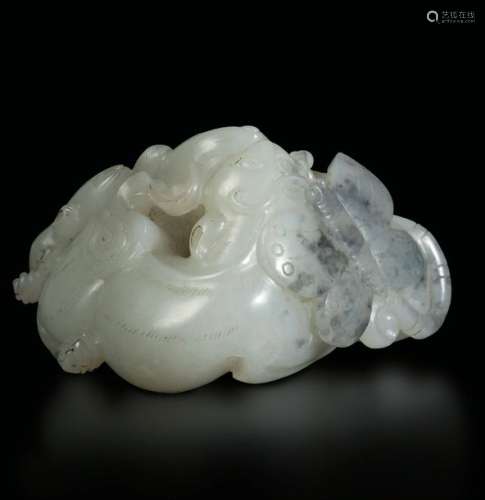 A white and russet jade group, China, Qing Dynasty