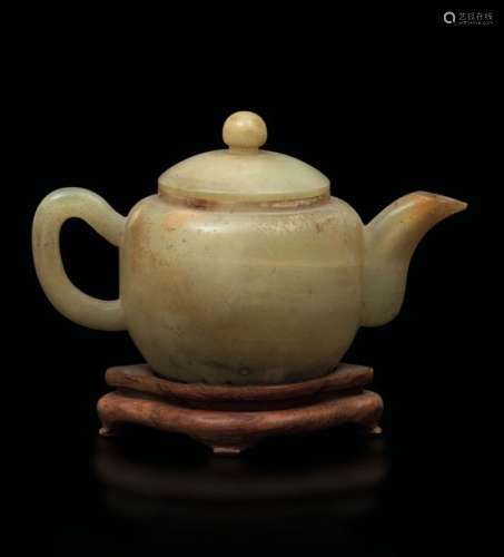 A yellow jade teapot, China, early 1900s