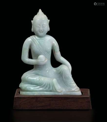 A jadeite Buddha figure, China, early 1900s