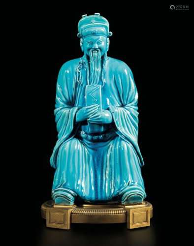 A porcelain and bronze figure, China, Qing Dynasty