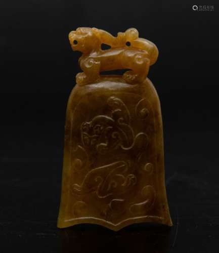 A carved jade bell, China, 1900s