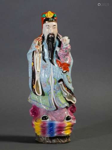 A porcelain Lu figure, China, early 1900s