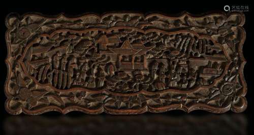 A carved wood box, China, 1900s