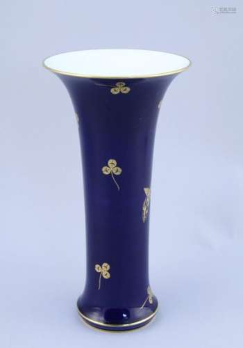 SEVERE. Porcelain CORNET VASE with gold decoration…