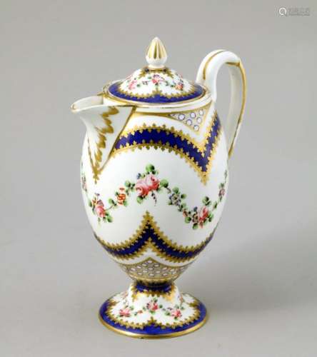 Porcelain teapot in baluster shape resting on a pe…