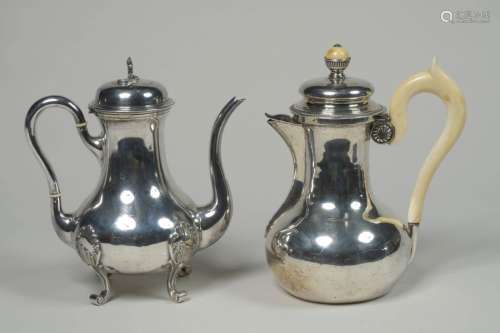 Set of two including a tripod teapot in the Louis …