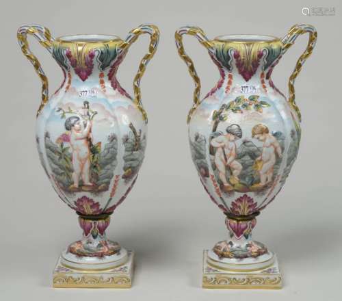 Pair of two handled vases in polychrome porcelain …