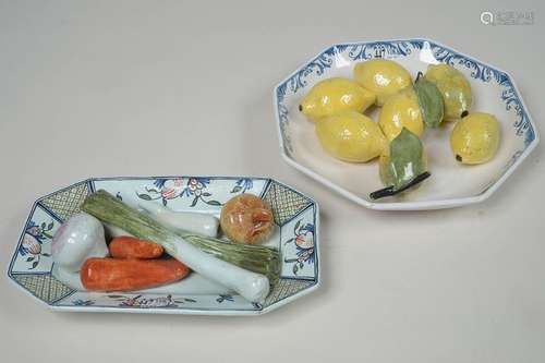 Two polychrome earthenware plates decorated with \