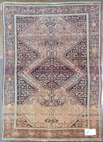 Handmade wool Seneh (?) rug decorated with a blue …