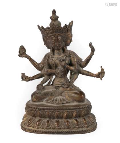 A Gilt Copper Alloy Figure of Ushnishavijaya, Tibet, probably 18th century, the seated goddess of