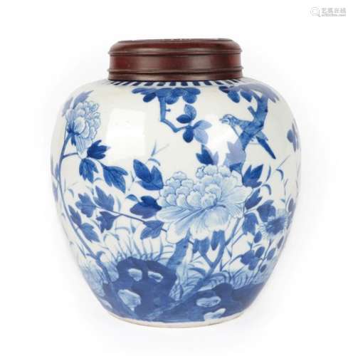 A Chinese Porcelain Ginger Jar, Kangxi, of ovoid form, painted in underglaze blue with a bird