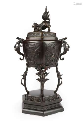 A Japanese Bronze Koro and Cover, Meiji period, of hexagonal form with mythical beast handles and