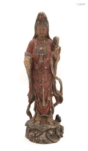 A Chinese Painted Wood and Gesso Figure of Guanyin, 19th century, standing wearing flowing robes,