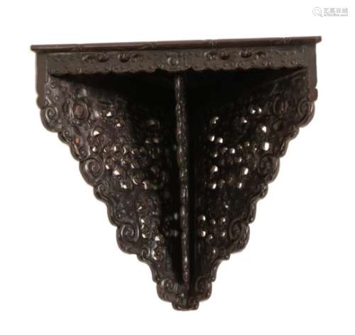 A Chinese Hongmu Corner Wall Bracket, 19th century, with apron and triangular supports, carved and