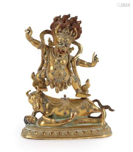 A Gilt Bronze Figure of a Wrathful Deity, 18th/19th century, with hands raised and snarling