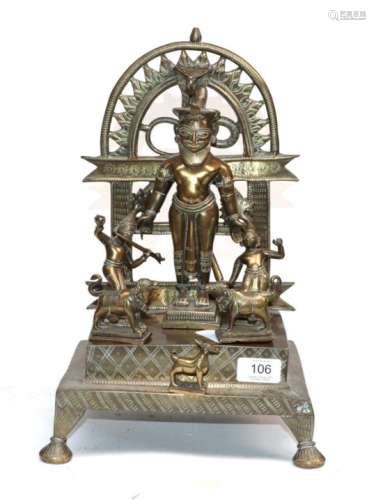 An Indian Bronze Shrine, 19th century, as Vishnu on an architectural arch, flanked by Rama and
