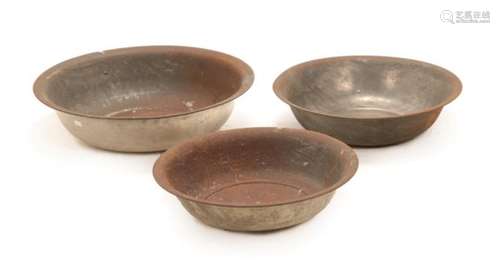 A Graduated Set of Three Tinned Basins, 19th century, of everted circular form, 76.5cm, 66cm and