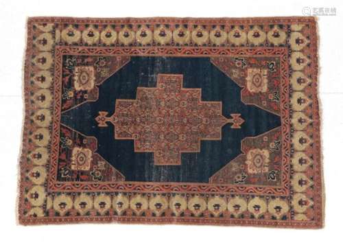 Senneh Rug Iranian Kurdistan, circa 1900 The plain indigo field centred by a stepped medallion