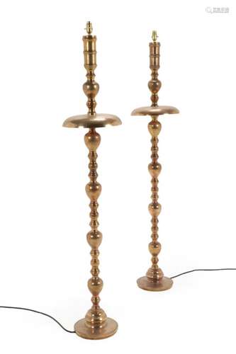 A Pair of Ottoman Brass Lamp Stands, late 19th/early 20th century, of knopped form with domed drip