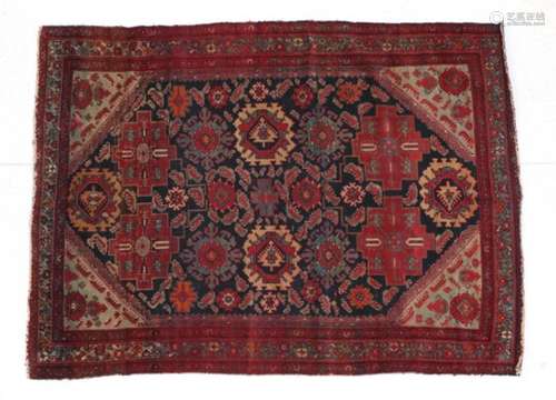 Senneh Rug Iranian Kurdistan, circa 1910 the indigo field with polychrome stylised flowerheads and