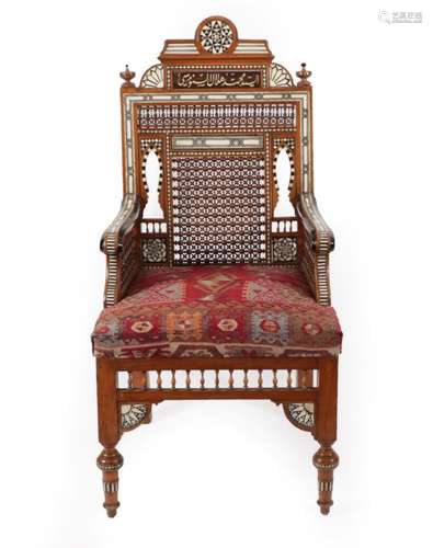 A Damascus Mother-of-Pearl and Bone Inlaid Ebonised Hardwood Throne Chair, late 19th century, the