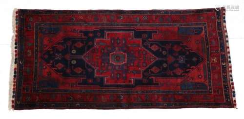 Luri Rug West Iran, 3rd quarter 20th century The indigo field centred by a scarlet medallion