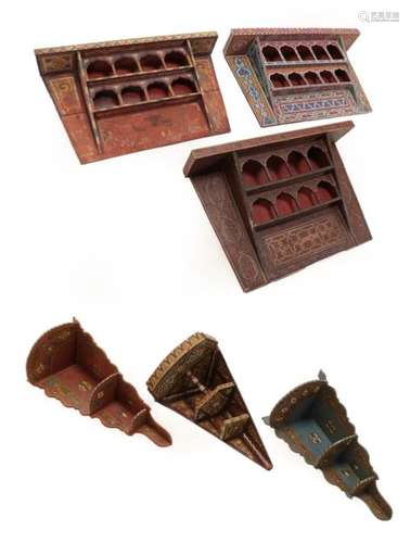 A Moroccan Painted Wood Set of Wall Shelves, late 19th/20th century, with rectangular cornice over