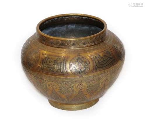 A White Metal and Copper Inlaid Cairo Ware Jar, 19th century, of ovoid form, worked with panels of