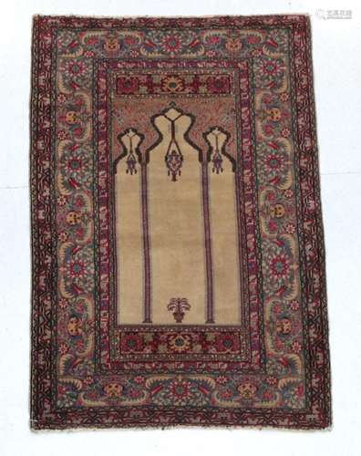 Ladik Prayer Rug Central Turkey, 20th century The ivory field with lamp beneath the Mihrab