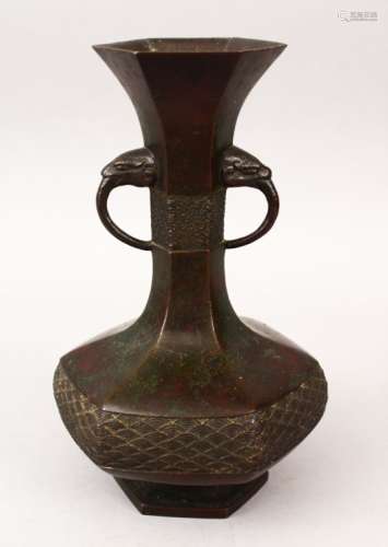 AN 18TH CENTURY CHINESE BRONZE ARCHAIC STYLE TWIN HANDLE VASE, with tin moulded beast handles,