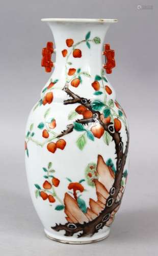 A 19TH CENTURY CHINESE FAMILLE ROSE PORCELAIN TWIN HANDLE VASE, the body of the vase decorated