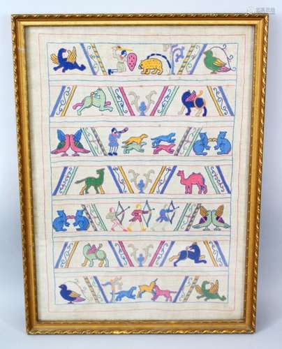 A 20TH CENTURY INDIAN FRAMED EMBROIDERED FABRIC PICTURE, embroidered to depict a variety of