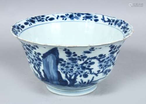 A GOOD CHINESE KANGXI PERIOD MOULDED BLUE & HITE PORCELAIN BOWL, decorated with birds and native