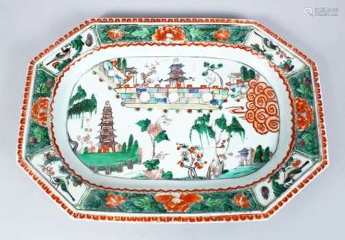 A GOOD 18TH CENTURY CHINESE FAMILLE VERTE PORCELAIN SERVING DISH, the decoration of a native