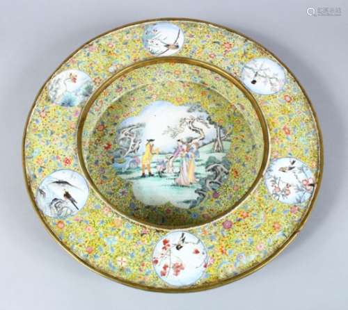 A LARGE & HEAVY QUALITY CHINESE ENAMEL CIRCULAR EUROPEAN SCENE DISH, the yellow ground decorated
