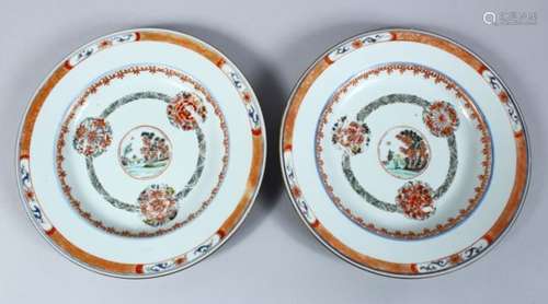 A GOOD PAIR OF CHINESE 19TH / 18TH CENTURY FAMILLE ROSE PORCELAIN PLATES, both decorated with