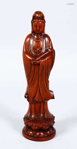 A GOOD 19TH / 20TH CENTURY CHINESE CARVED BOXWOOD FIGURE OF GUANYIN, stood upon a lotus form base,