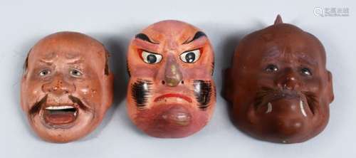 THREE GOOD JAPANESE MEIJI / TAISHO PERIOD LACQUER NOH MASKS, two with real hair details, 6cm. (3)