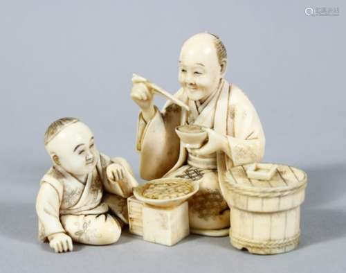 A GOOD JAPANESE MEIJI PERIOD CARVED IVORY OKIMONO OF MAN & BOY, both seated eating food from the