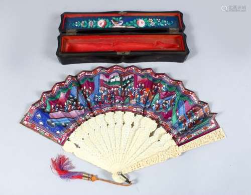 A GOOD 19TH CENTURY CHINESE CANTON CARVED IVORY AND PAINTED FAN IN BOX, the fan depicting figures in