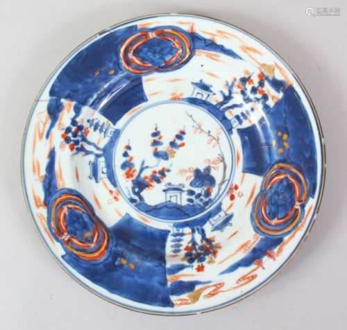 A 19TH CENTURY CHINESE IMARI PORCELAIN PLATE, (AF), 22.5cm diameter.