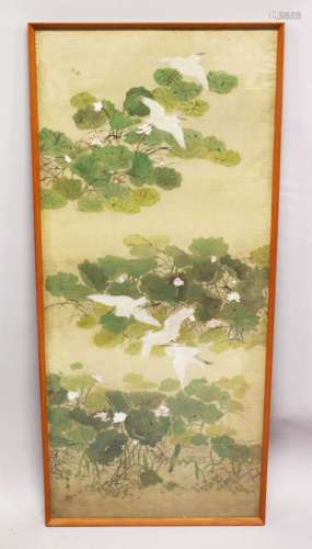 A GOOD CHINESE SCHOOL WATERCOLOUR ON SILK, depicting birds in flight amongst foliage, 117cm x 52cm.