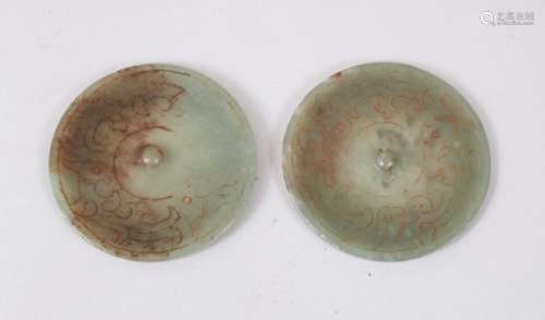 A PAIR OF CHINESE JADE / JADELIKE PENDANTS / BUTTONS, carved decoration, 5.5cm diameter